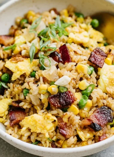 A bowl of Breakfast Fried Rice with colorful vegetables and eggs, perfect for mornings