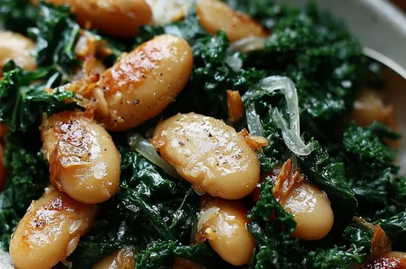 Pan-fried beans served with sautéed kale in a vibrant dish