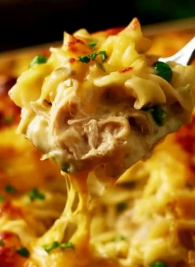 Pioneer Woman's Chicken Noodle Casserole served in a dish with garnishes