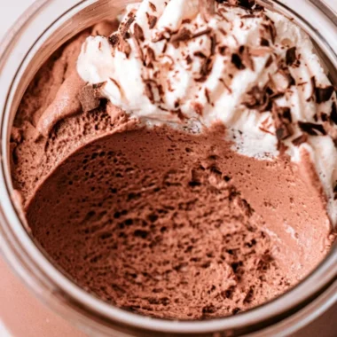 Delicious homemade chocolate mousse served in elegant dessert cups.