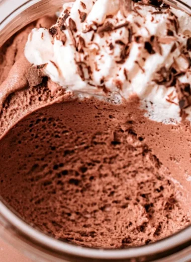 Delicious homemade chocolate mousse served in elegant dessert cups.