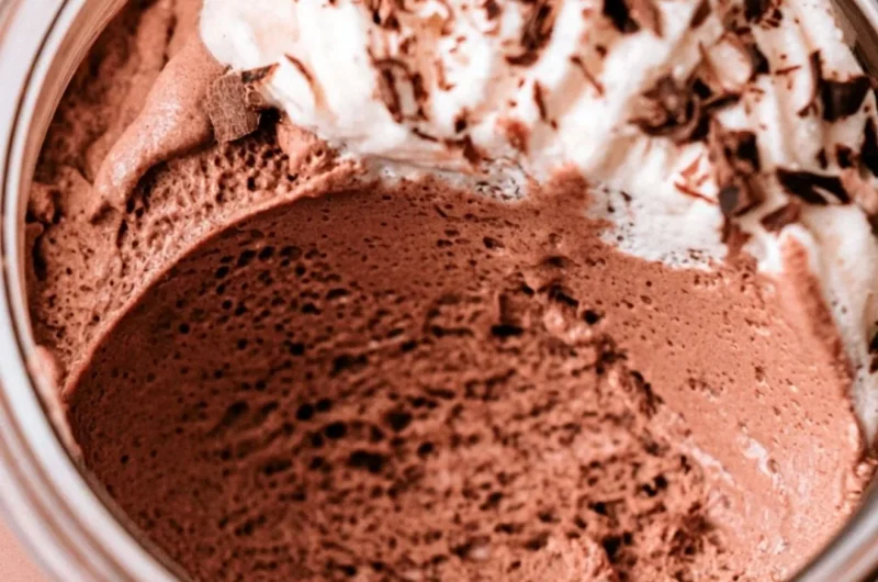 Delicious homemade chocolate mousse served in elegant dessert cups.