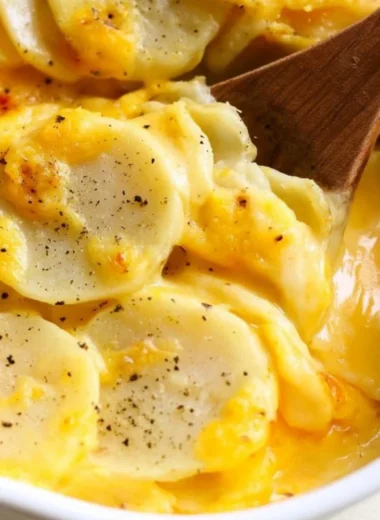 Delicious scalloped potatoes baked with cheese and herbs